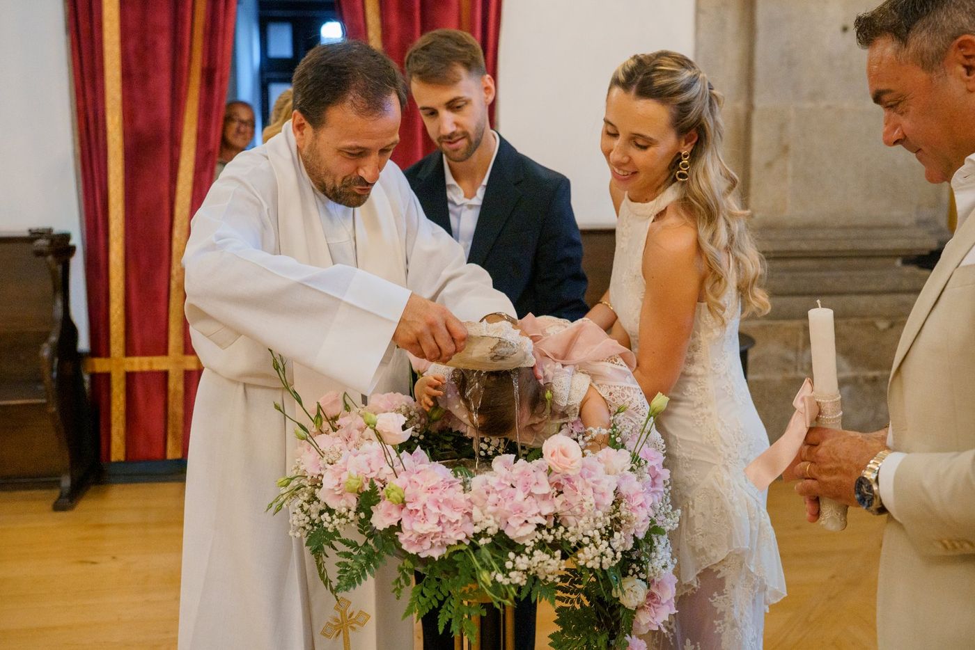 The baptism at the font