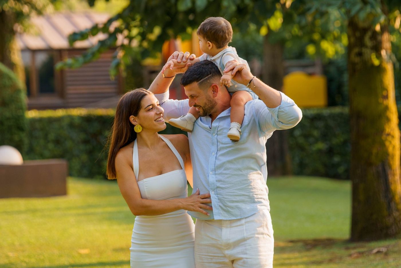 Dad carrying the baby on his shoulders