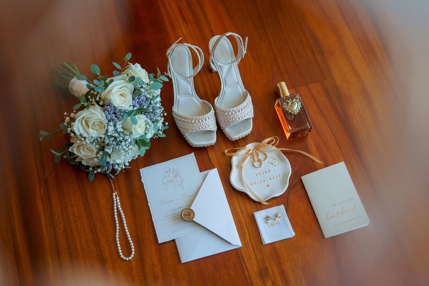 Bouquet, shoes, perfume and invitation