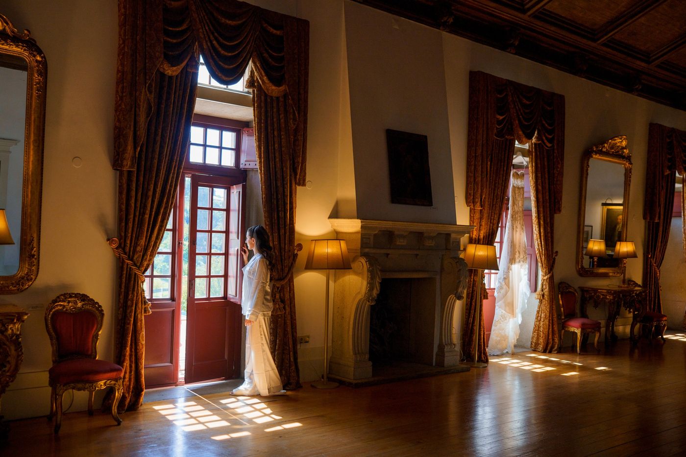Bride at the window of an old room