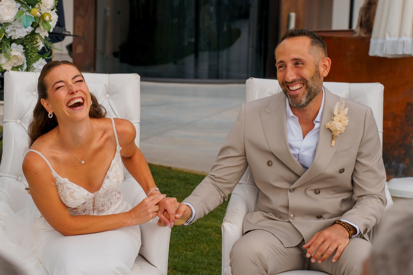 Bride and groom laughing during the civil ceremony