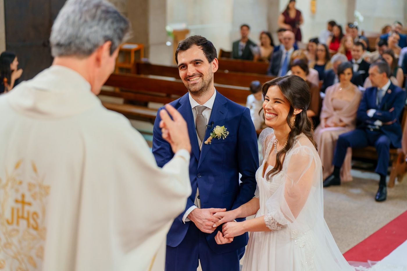 Priest blessing the bride and groom