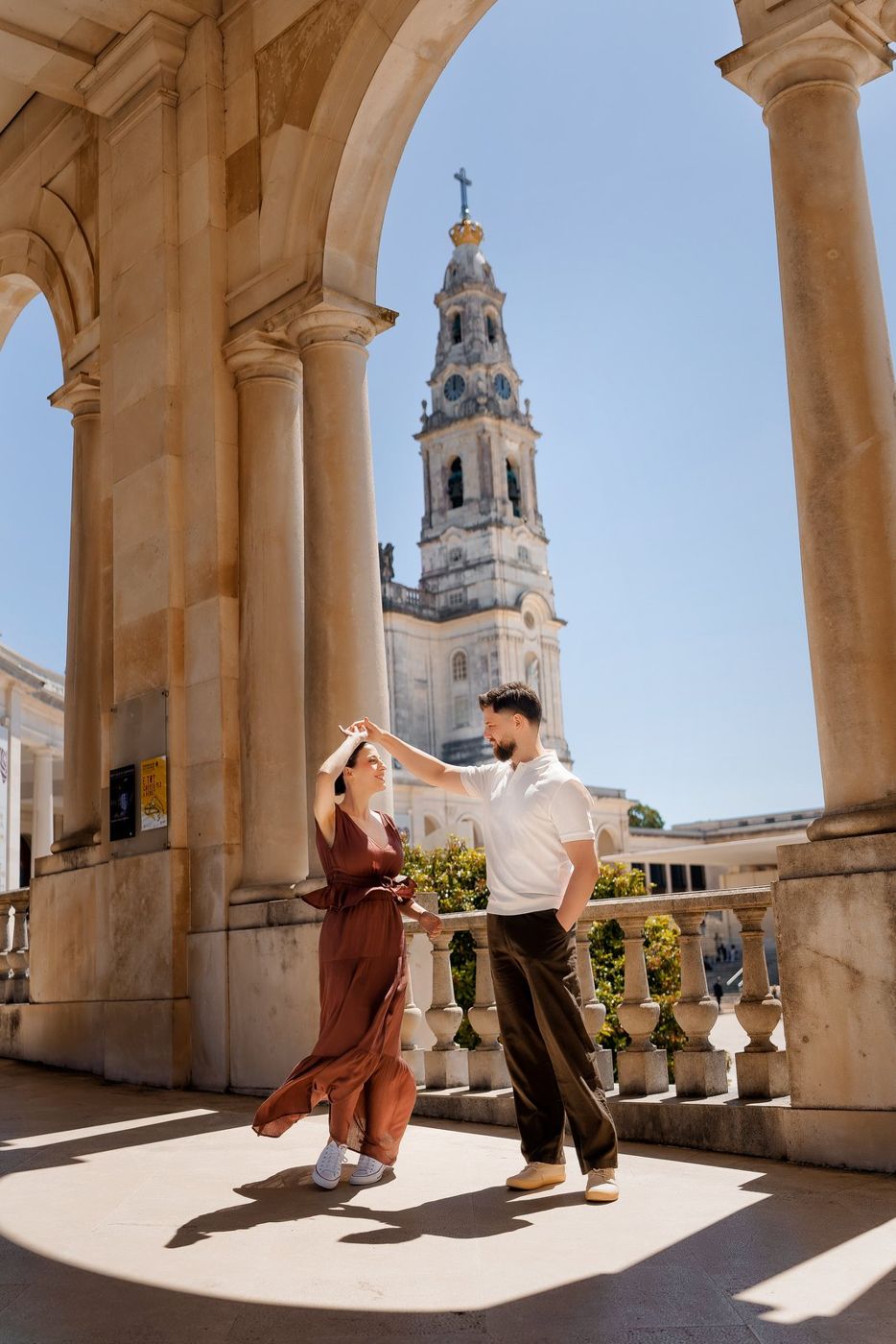 Couple dancing under the arcades in Fátima